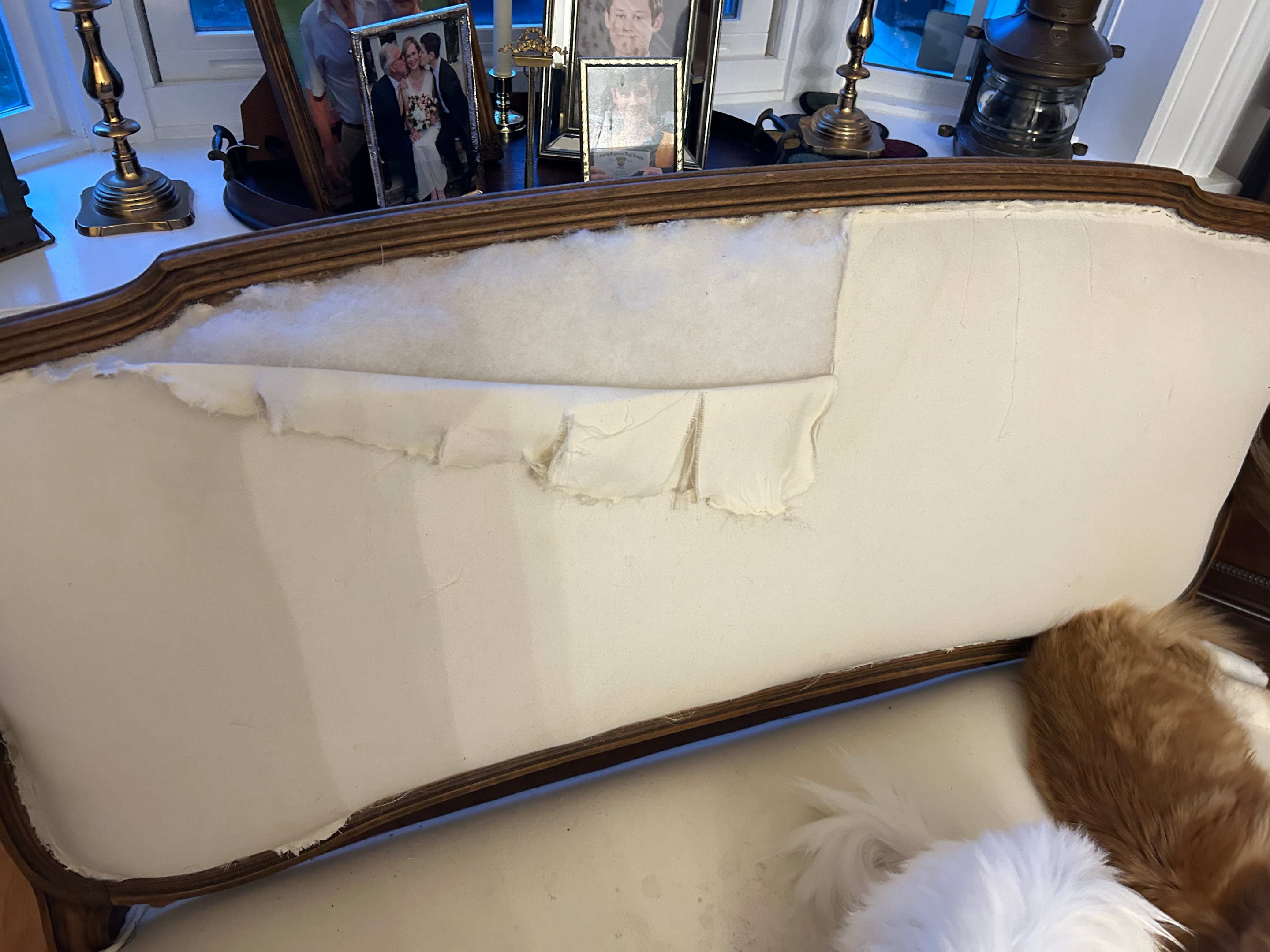 Removing the upholstery from a vintage settee